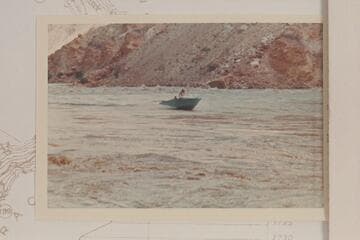 Harris-Brennan boat out of lower end of Rapid 22. The Sliced Boulder is just ahead of the boat