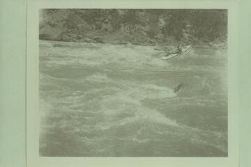 One of the Reynolds' sadiron boats dropping into head of Upper Disaster Rapid