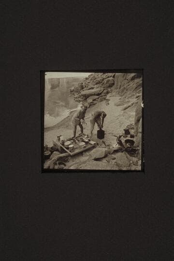 Dishes, dishes, dishes. Eisaman and Masland bathe the dishes at Diamond Creek