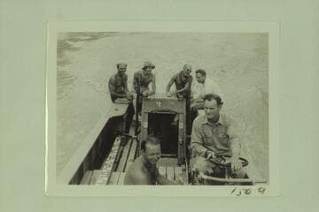 Riding from Bridge Canyon City to Separation Canyon.  Pres Walker and Whipple at front.  At back:  Nevills, Garth Marston, Dock Marston, McConkie