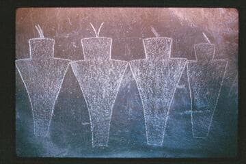 Glyphs on rocks near Hite inscription