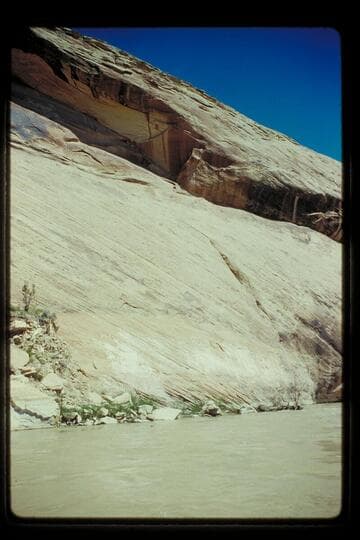 Where old road is cut away, San Juan River