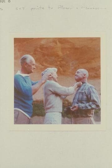 Harry Aleson approves the extra touch that Barbara Monroe gives to Bering Monroe before the wedding in The Chapel