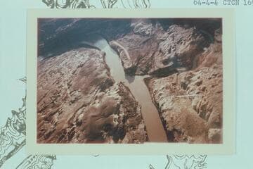 Down to mouth of the Dirty Devil River. Construction air strip at right bank