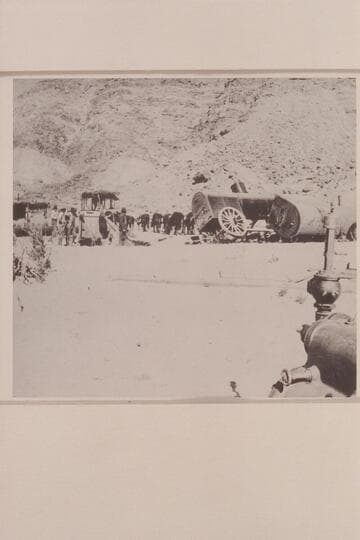 Unloading boilers at Lees Ferry; Spencer placer operation. The large steam pumps are at the right