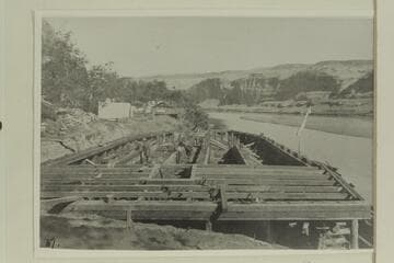 Hull of Hoskanini dredge. Under construction at Mile 121 in Glen Canyon