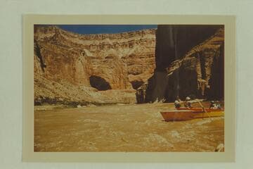 Jack Brennan handling his glass outboard boat with the oars. Mile 47. Triple Alcoves