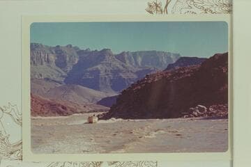 The "Dock" up through the riffle at Mile 66. Buzz Belknap at the wheel and Ed l'Anson piloting. Taken from the "Wee Red."
