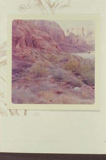 Up river from the road grade cut by the crew with Galloway to Hole in the Rock which is upper right center.  From location of the eagle inscription