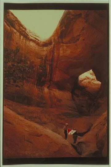 Ba-Sah Bridge. Marston and Masland holding Explorers Club flag