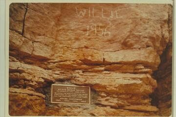 Marking and plaque at Willie's grave