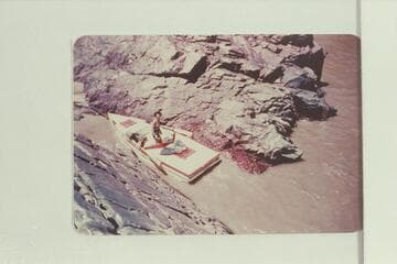 Susie Reilly in the "Galloway," 2/3 of the way down Sockdologer Rapid. Bright Angel gauge: 15,000 cfs