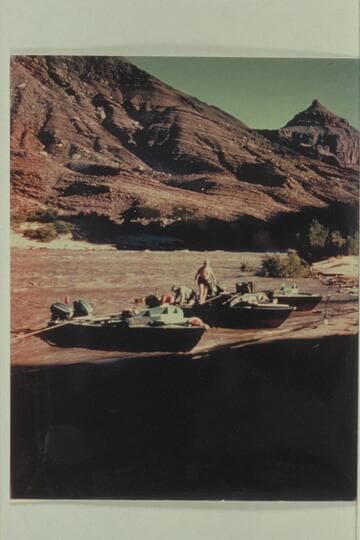 Camp at left bank; Temple Butte at upper right