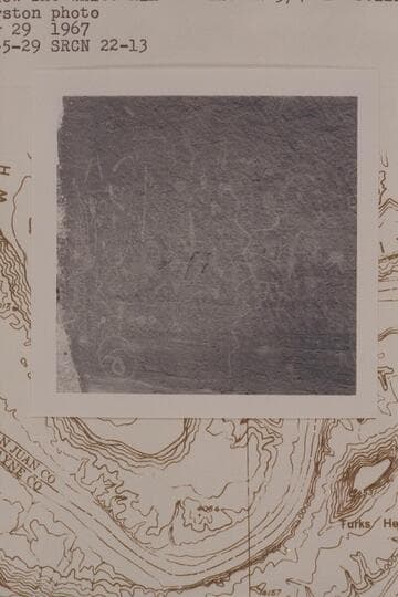 Prehistoric drawings on second large boulder at foot of talus below the White Rim; Mile 22 3/4, Stillwater Canyon