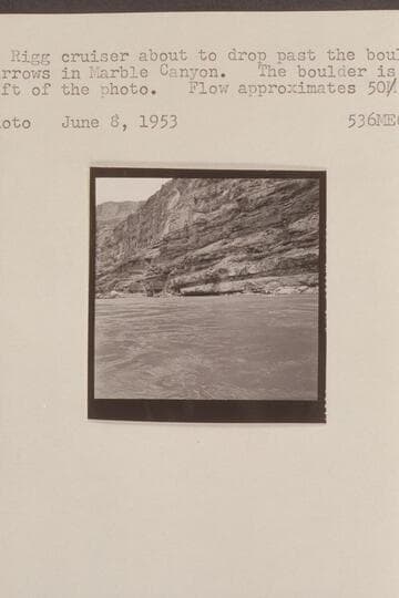 The second Rigg cruiser about to drop past the boulder at Boulder Narrows in Marble Canyon. The boulder is at the extreme left of the photo. Flow approximates 50,000 cfs