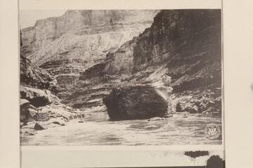 Boats on both sides of the boulder in Boulder Narrows, Mile 18 1/2, from below.   National Archives