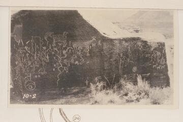 Glyphs on boulder on right bank at Mile 22 3/4 of Green River