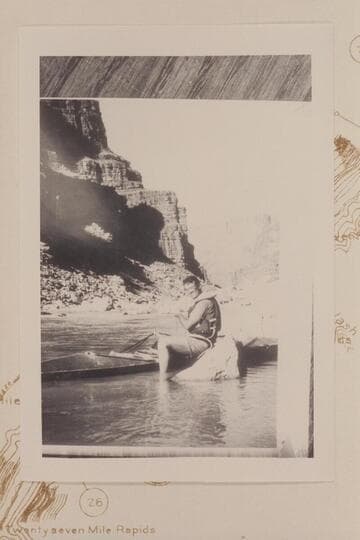 Les Jones replacing lock broken in 23 1/2 Mile Rapid