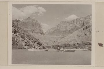 The two outboard boats cruising in the lagoon at the mouth of the Little Colorado River. In the lefthand boat, the "Twin," are Daniels, Juan and Sanderson. In the "June Bug" are Jordan and Macdonald