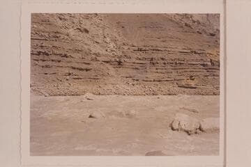 The "Wen" piloted by Norman Nevills in Soap Creek Rapid.  Randall Henderson riding on after deck
