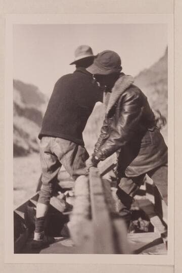 Glen and Bessie Hyde at the sweeps below Monument Creek Rapid