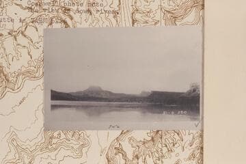 View upstream, at a big castle butte in distance.  The butte is VABM 6226.  Across Tuxedo Bottom from Mile 22 1/3 in Stillwater Canyon
