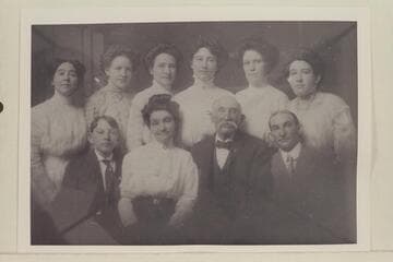 The James White family.  [back row] Carrie; Esther; Emma; Bertha; Flora; Mary (Mick).  [front row] Arnold; Octavia; James; Ven
