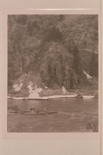 The scow comes in for a landing at an icy camp
