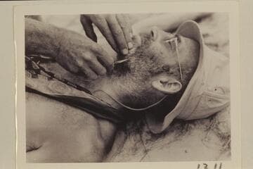 The act of giving Dock Marston a clipping.  Diamond Creek