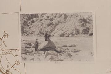 Galloway at right pointing to course through rapid in Split Mountain at Mile 204.5. Their count was #7