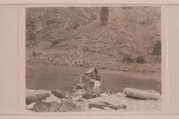 The dunnage shore; the tent being rigged; the rubber boat is for a running boat