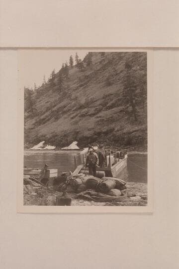 The scow beached, the sweeps unshipped, and the dunnage going shore