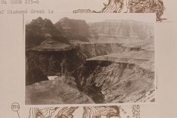Downriver from inner rim at Mile 225.3 right bank. The mouth of Diamond Creek is lower left