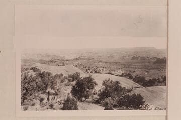 Looking north from #126; country north of Javajo Mountain. Taken on trip to discovery of Bridge. The view appears to be up into the San Juan from a point near Cha Butte