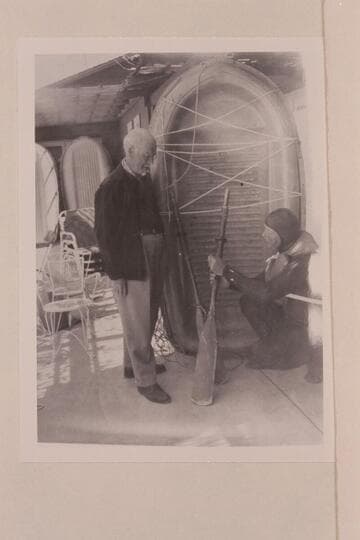 Dock Marston and Bill Belknap with Sportyak.  Boulder City.  News photo