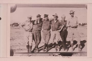 Part of USGS crew at Green River before start of the survey of Cataract Canyon under direction of W. R. Chenoweth. At Greenriver, Utah. Hite/Hyte; Morgan? Lint; Woodward; Clogston; truck driver--Phelps?