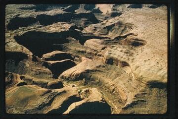 Skyline; Arch at upper cneter; down Escalante River