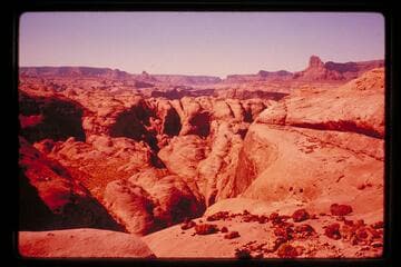 Across Anasazi Canyon and down Glen Canyon from east of joint and north of Lehi