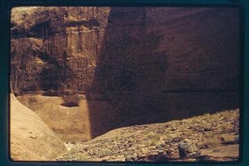 Up 73 from left bank above drop near mouth