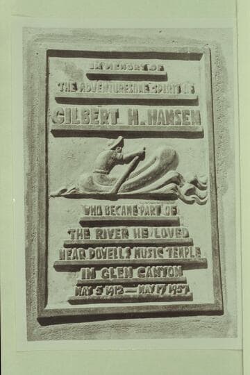Plaque--"Gilbert Hansen"--under end of highway bridge at Marble Canyon