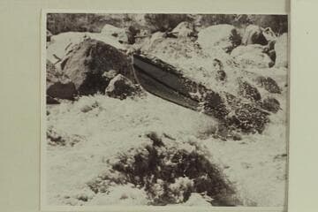 Rod Sanderson pilots the "Twin", Daniels is passenger. Badger Creek Rapid