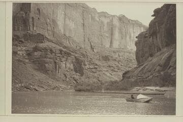 Frank E. "Jackie" Frost on San Juan River.  One of the Hall folding boats.  "Lower can--perhaps Mile 2-4 (from formation only)."  PTR 8-28-58 [Reilly]