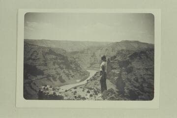 Desolation Canyon, 114 miles below Jensen, Utah. A climb-out in Desolation. The girl is Mildred Davis
