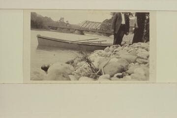 The "LiVingston, Mont."--open steel skiff used by Lewis R. Freeman on Yellowstone.  Captioned:  "We Launched the Boat Below the LiVingston Bridge."