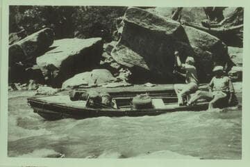 Mace and Dunham in some extraordinary seamanship in trying to run the "Leakin Lena" down the Yampa.  Obviously they are due for adventure