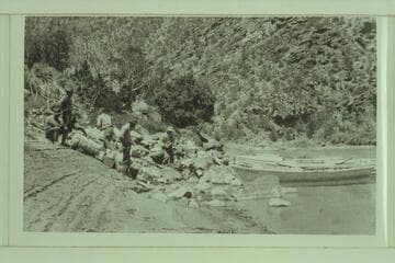 Portage of dunnage at Hells Half Mile. The boats were nosed through the middle section of the rapid
