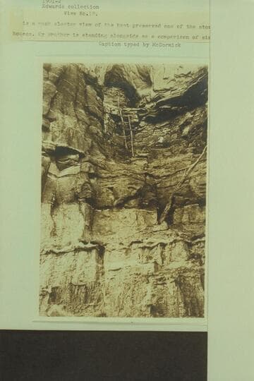 View No. 12--"is a much closer view of the best preserved one of the storage houses.  My Brother is standing alongside as a comparison of size" [McCormick]