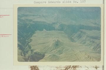 South to parachutists' camp site. Note Scylla Butte near the rim of Slate Creek