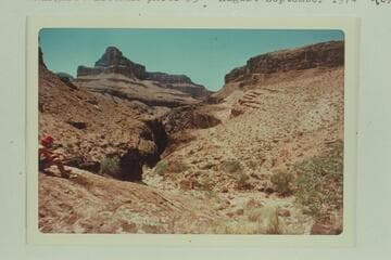 From Bass Asbestos Mine in Hakatai Canyon looking across and down this canyon.  A trail appears on right bank.  There were many burros in the area