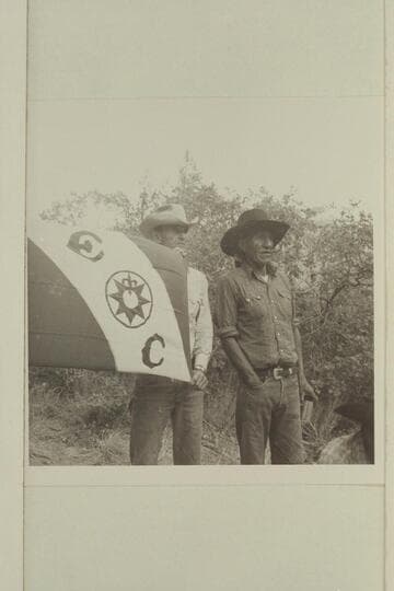 Tom Daly at the serious business of holding the flag.  Tobe Owl-Nasja Begay beyond Tom.  Middle fork of 73